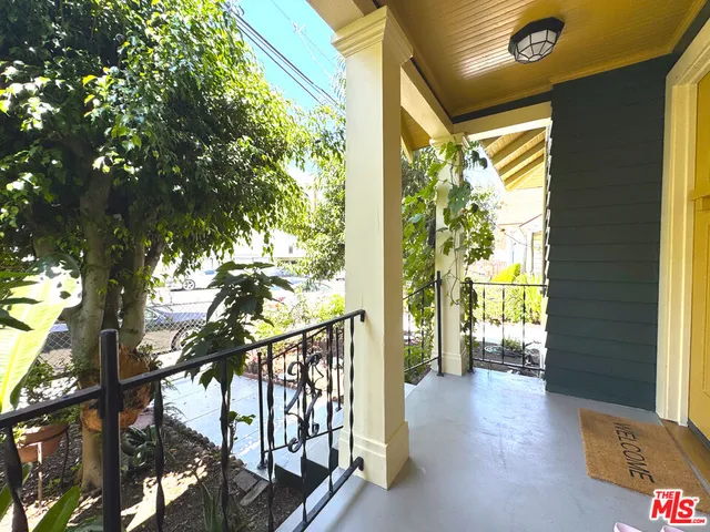 a view of an entryway with table and a window