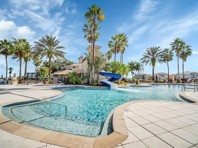 a view of outdoor space with palm trees