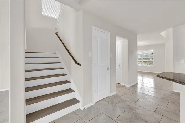 a view of an entryway with staircase