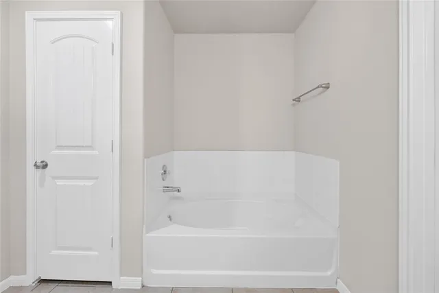 a bathroom with a bathtub