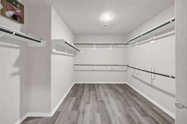 a view of an empty walk in closet