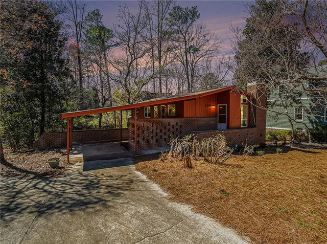 a view of hallway with windows