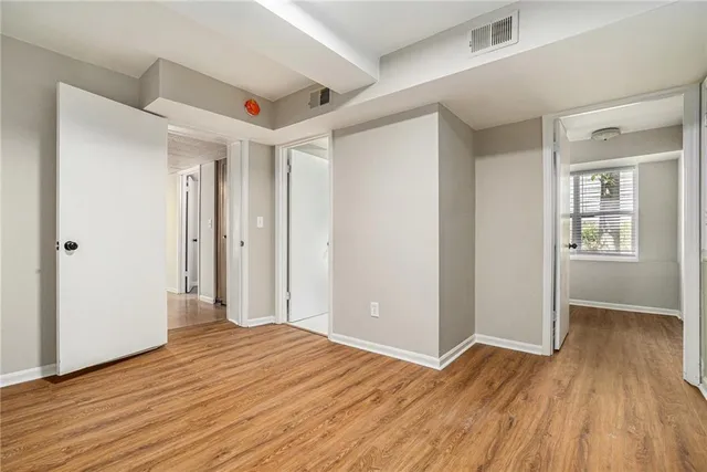 a kitchen with a refrigerator and a stove