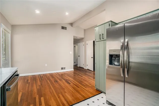 a bathroom with a sink a mirror and a bathtub