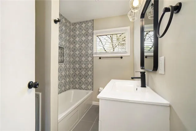 a bathroom with a sink and a toilet