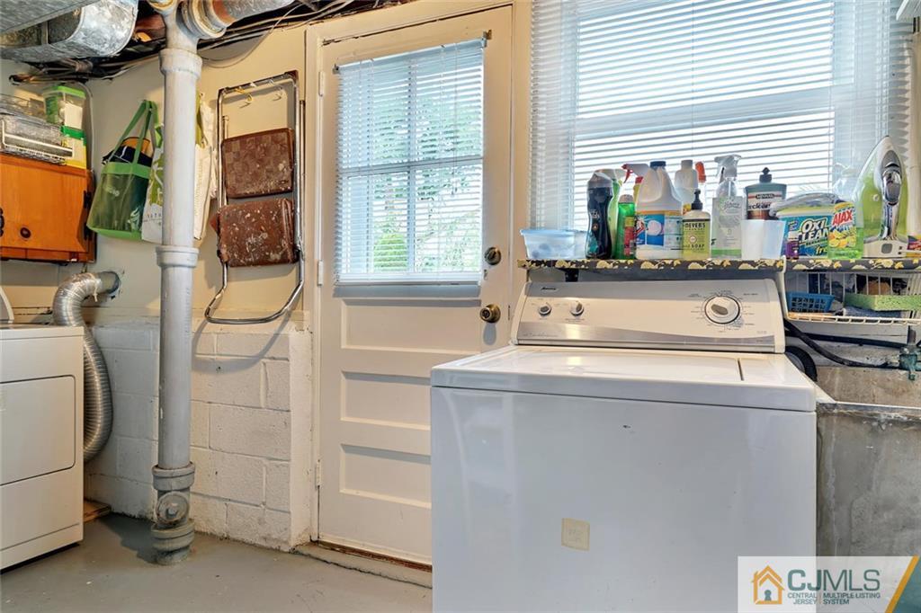 642 Inwood Road Linden, NJ 07036 - Photo 22 of 25 a utility room with dryer and washer