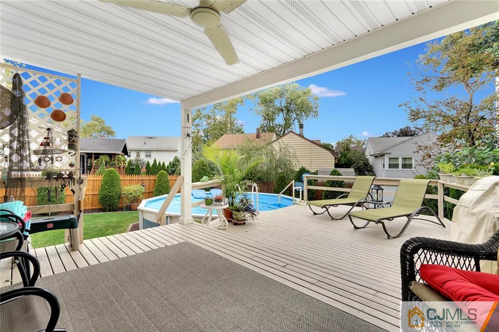 642 Inwood Road Linden, NJ 07036 - Photo 23 of 25 a view of a patio with couches table and chairs and potted plants
