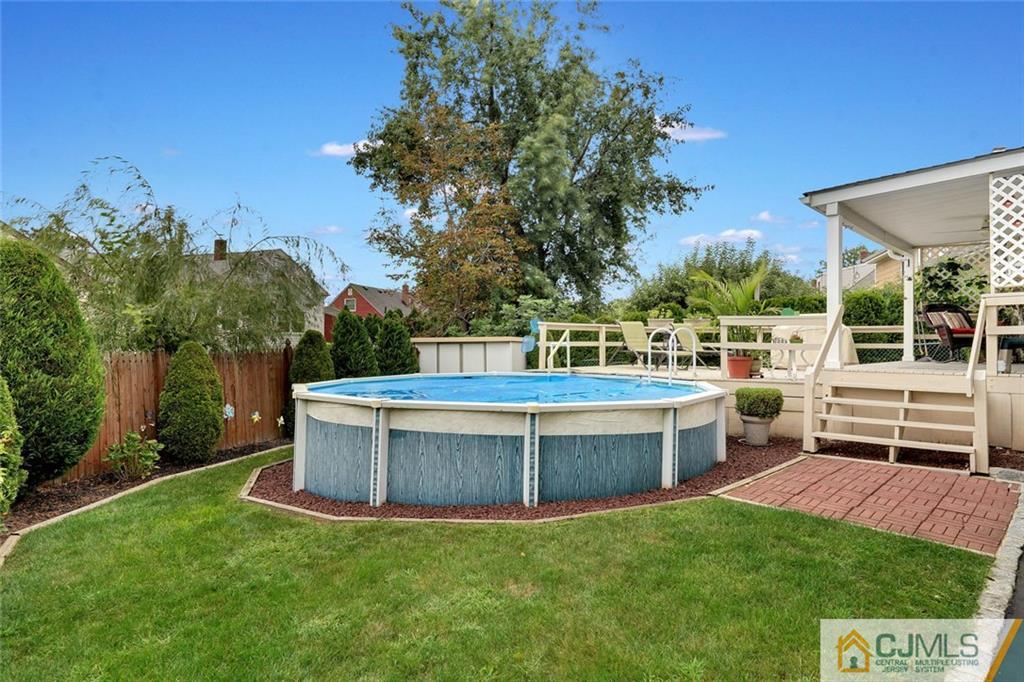 642 Inwood Road Linden, NJ 07036 - Photo 24 of 25 a view of a chairs and table in the back yard