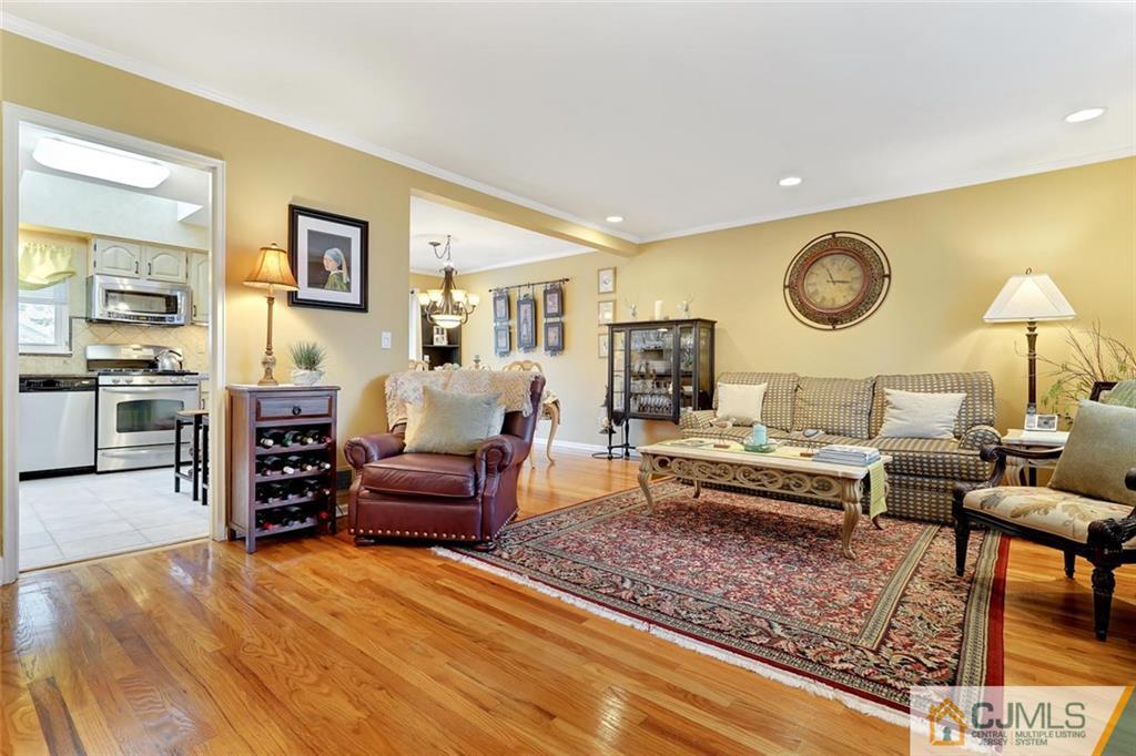 642 Inwood Road Linden, NJ 07036 - Photo 5 of 25 a living room with furniture and a table