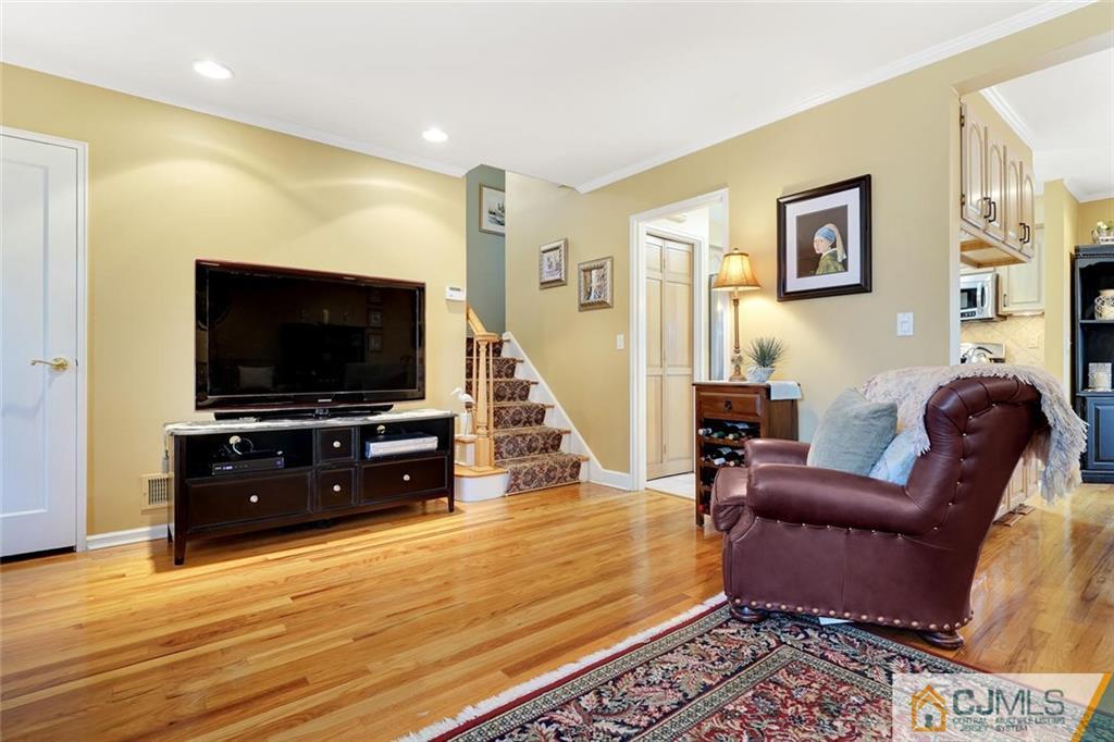 642 Inwood Road Linden, NJ 07036 - Photo 7 of 25 a living room with furniture and a flat screen tv