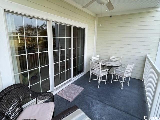 1008 Ray Costin Way, Unit 310 Murrells Inlet, SC 29576 - Photo 30 of 40 Balcony featuring ceiling fan
