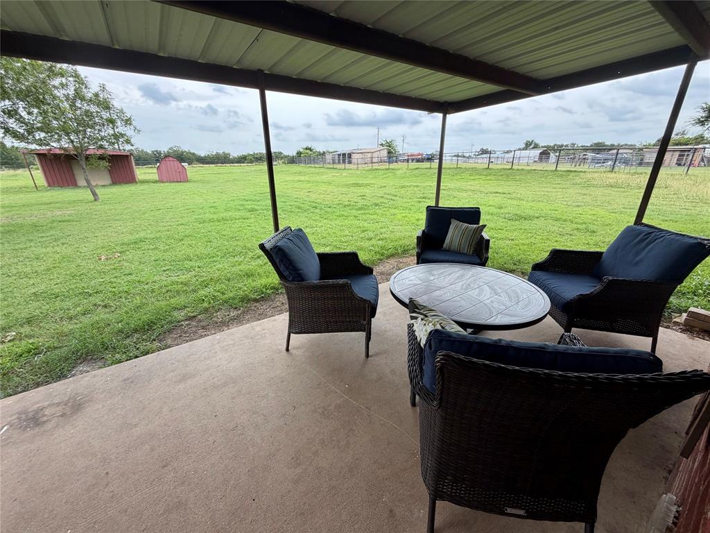 826 Gilliland Road Springtown, TX 76082 - Photo 16 of 28 Spend Your Time in the Back under the Covered South Facing Patio