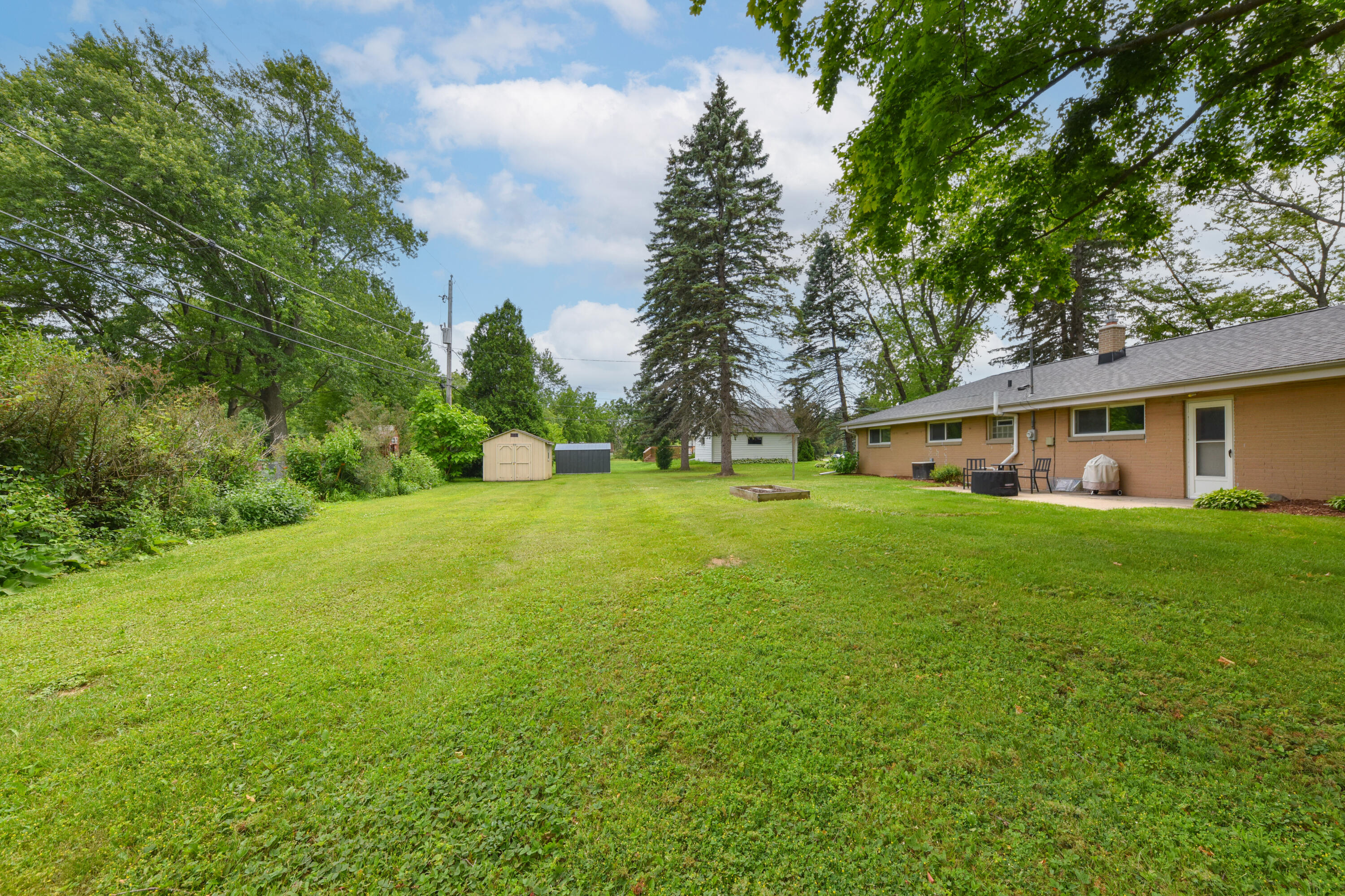W156 N8028 Pilgrim Road Menomonee Falls, WI 53051 - Photo 28 of 30 Backyard