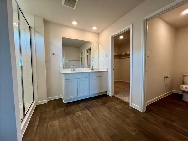 a view of a kitchen from the hallway