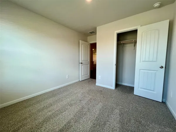 an empty room with closet