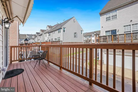 a balcony view with a seating space