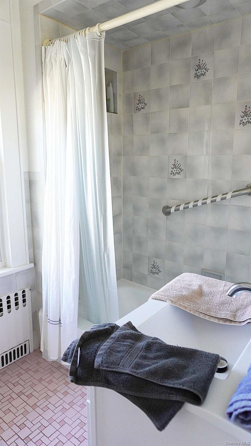 20 Pelhamside Drive New Rochelle, NY 10801 - Photo 15 of 28 a bedroom with a bed and a window