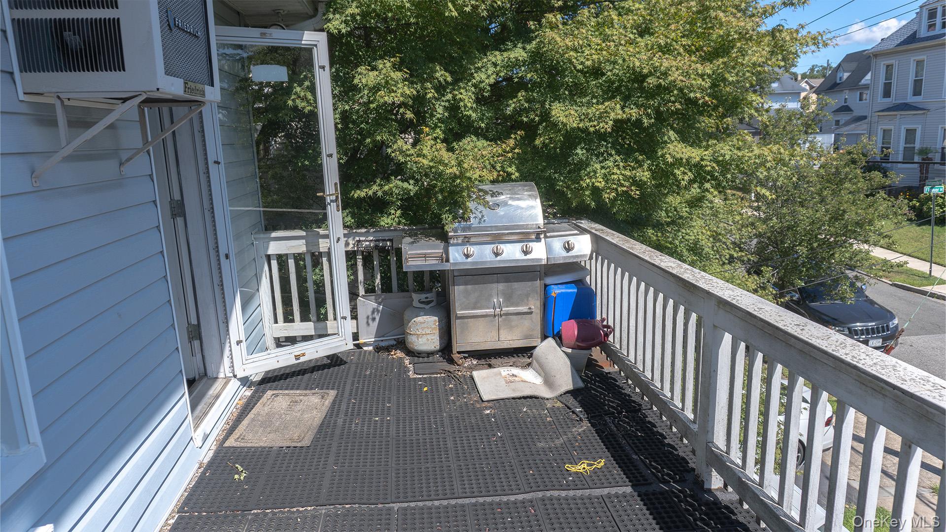 20 Pelhamside Drive New Rochelle, NY 10801 - Photo 17 of 28 a view of a balcony with wooden floor