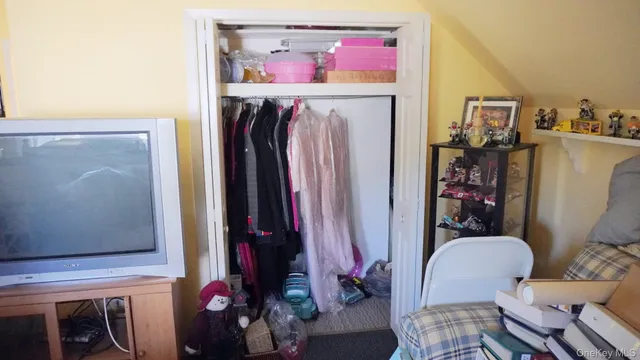 a view of living room with furniture and toys