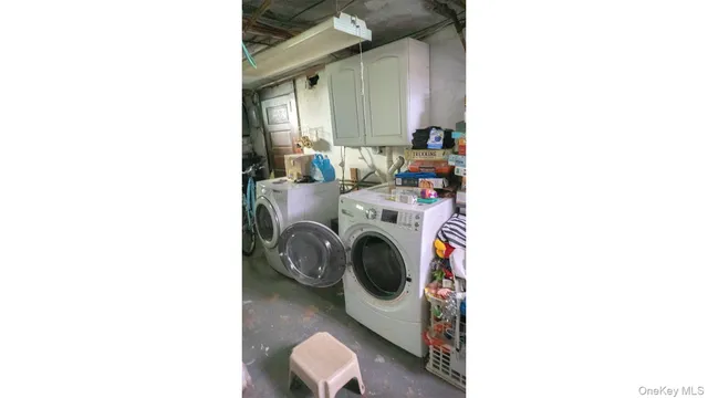 a utility room with dryer and washer