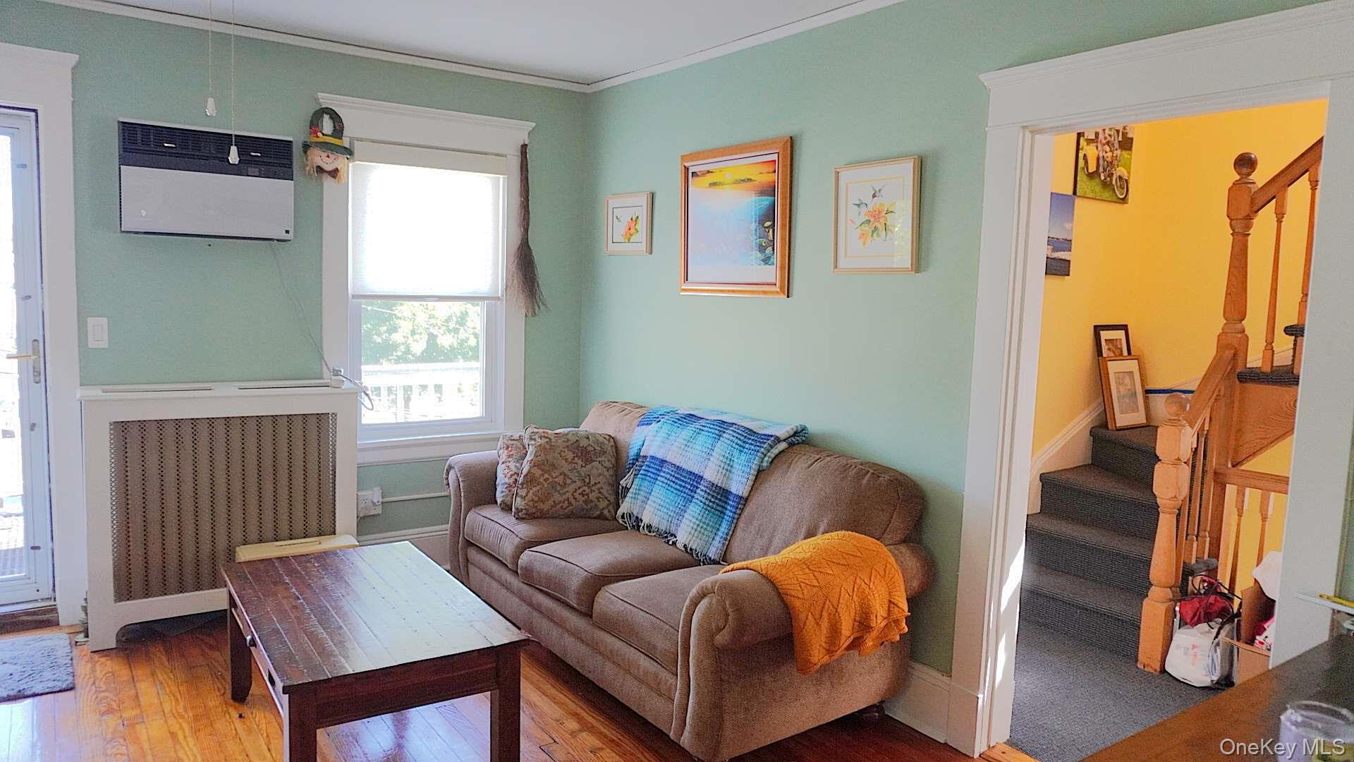 20 Pelhamside Drive New Rochelle, NY 10801 - Photo 6 of 28 a living room with furniture and a window