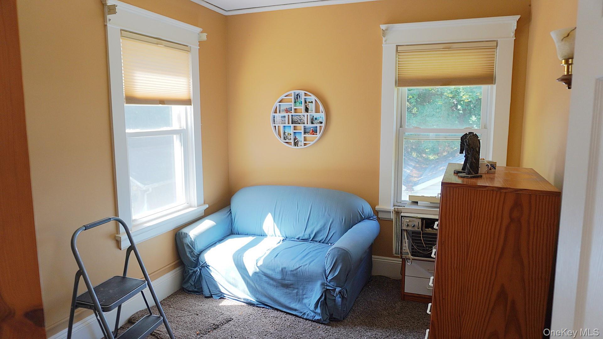 20 Pelhamside Drive New Rochelle, NY 10801 - Photo 8 of 28 a view of a workspace with furniture and a window