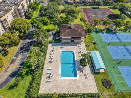 an aerial view of a house with a garden
