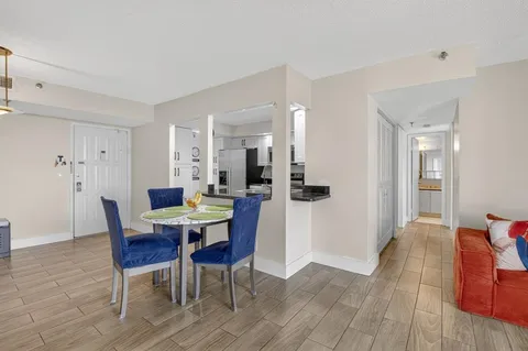 a view of a dining room with furniture