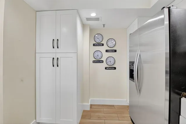 a bathroom with a shower and a sink