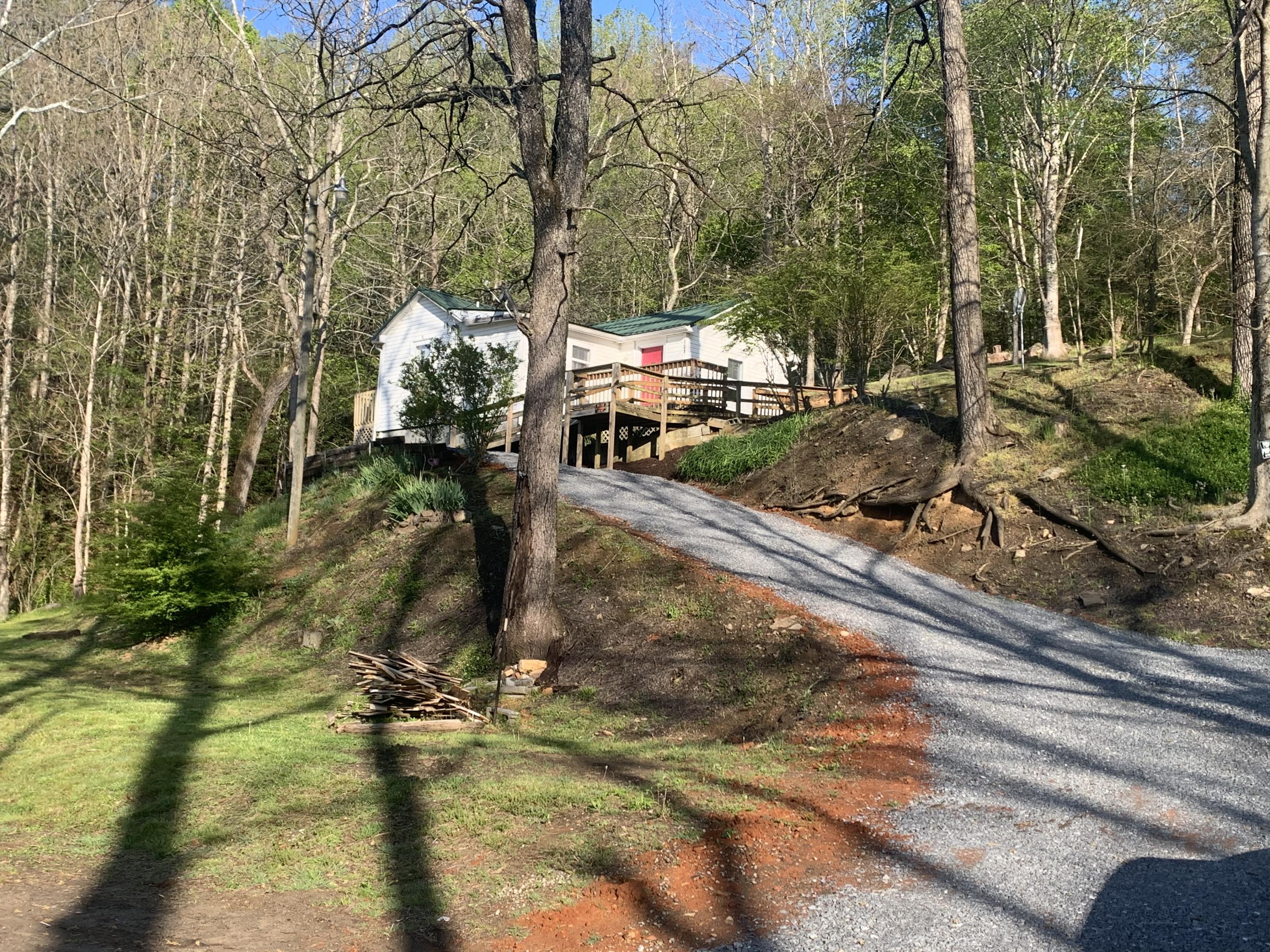 221 Bumpus Cove Road Erwin, TN 37650 - Photo 1 of 27 8D04BA5C-4E69-43FE-8E13-0325167F65CA