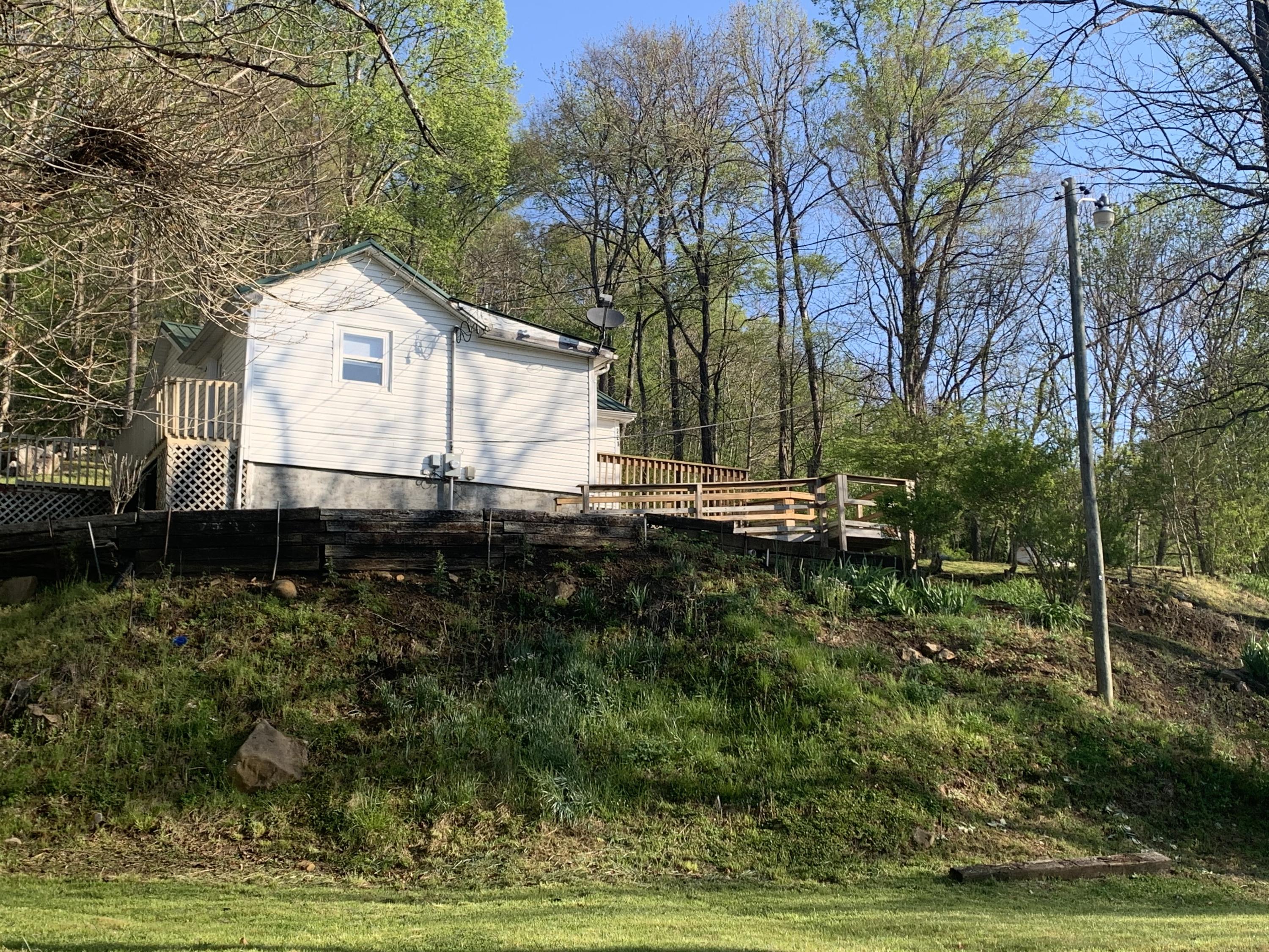 221 Bumpus Cove Road Erwin, TN 37650 - Photo 3 of 27 73340F71-B3E7-4D85-8D2A-7F7E81E80868