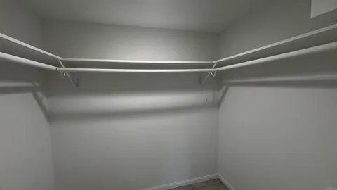 a view of a room with racks on the wall