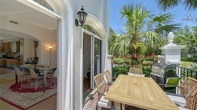 a view of entryway with a chandelier and rug