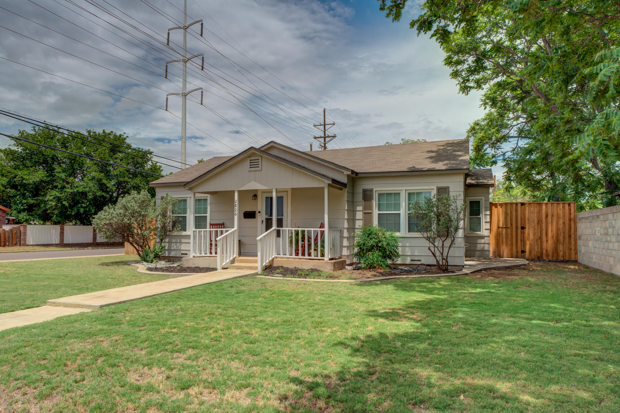 2826 33rd Street Lubbock, TX 79410 - Photo 2 of 33 a front view of house with yard and seating area