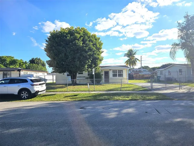 a view of pool and outdoor space