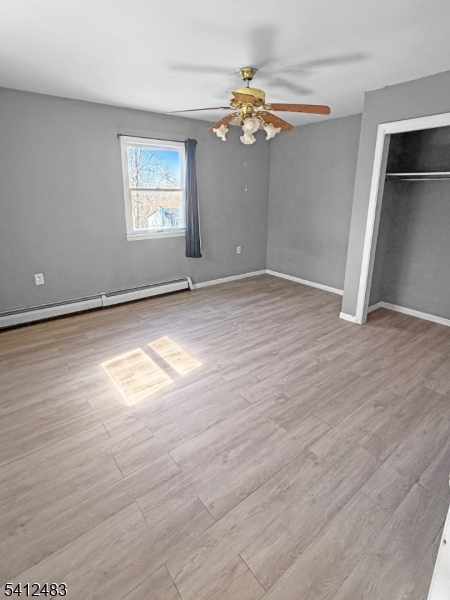 62 Ridgeway Avenue Blairstown, NJ 07825 - Photo 9 of 11 a view of an empty room with wooden floor and a window