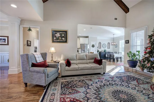 a living room with furniture or couch and a couch