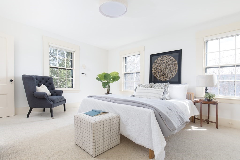 13 Yerxa Road Cambridge, MA 02140 - Photo 13 of 24 a bedroom with a bed and chair