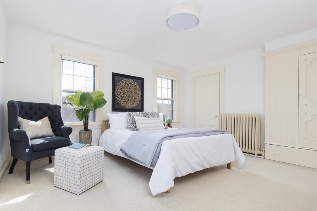 13 Yerxa Road Cambridge, MA 02140 - Photo 14 of 24 a bedroom with a bed and window
