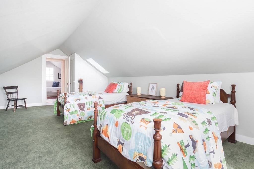 13 Yerxa Road Cambridge, MA 02140 - Photo 19 of 24 a bedroom with two beds and a table
