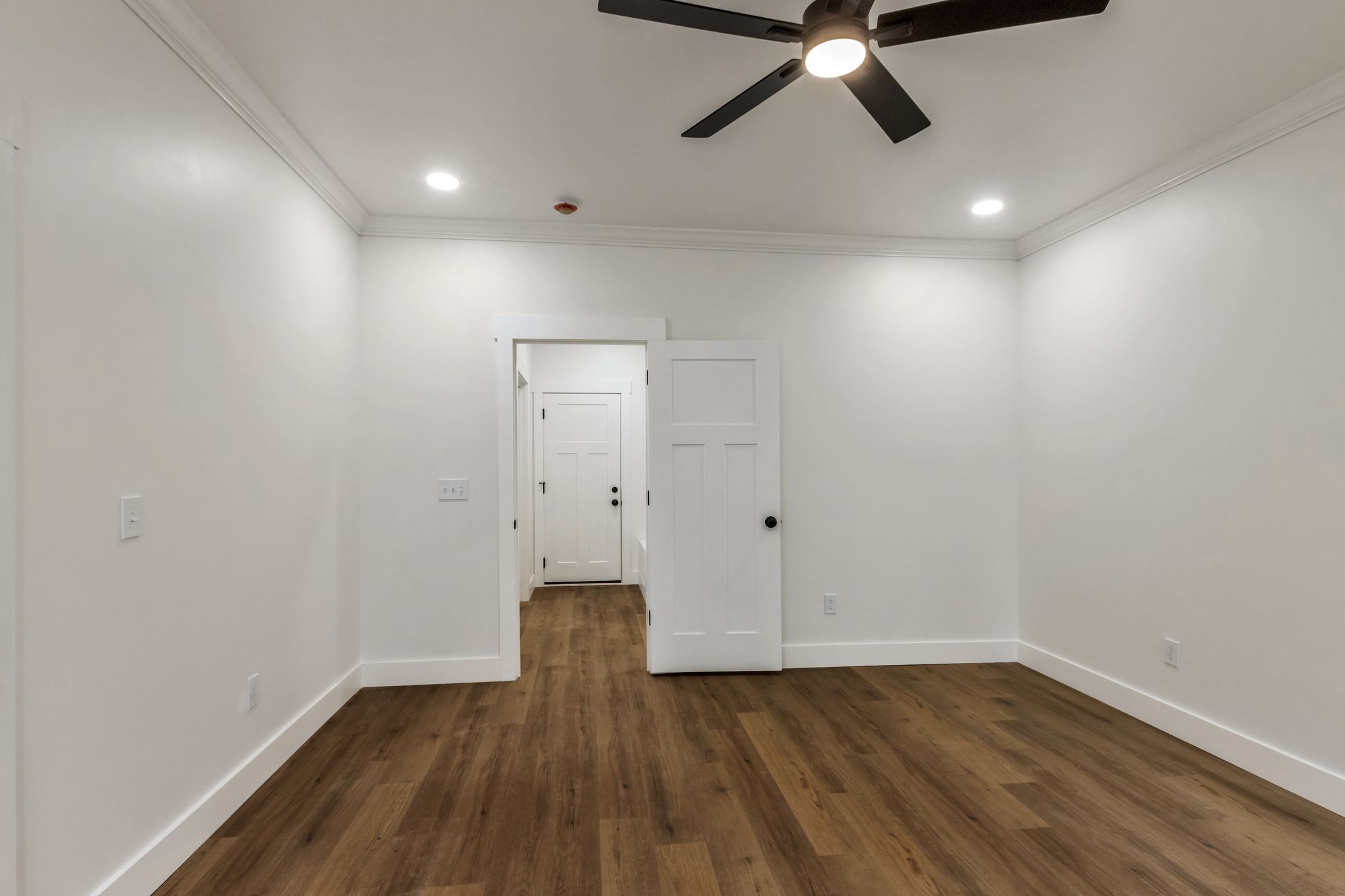 482 Boswell Road Winchester, TN 37398 - Photo 16 of 36 a view of an empty room with wooden floor