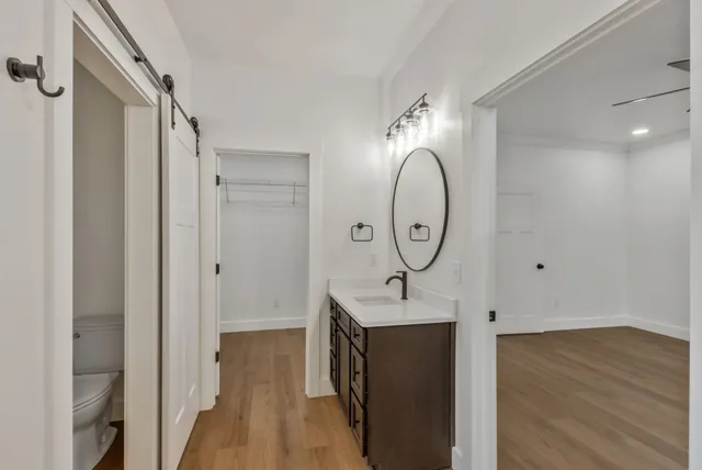 a view of a entryway door with wooden floor