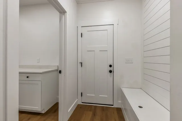 a bathroom with a tub and shower