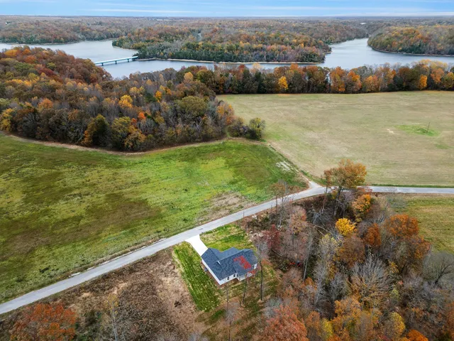 a view of a lake with a yard