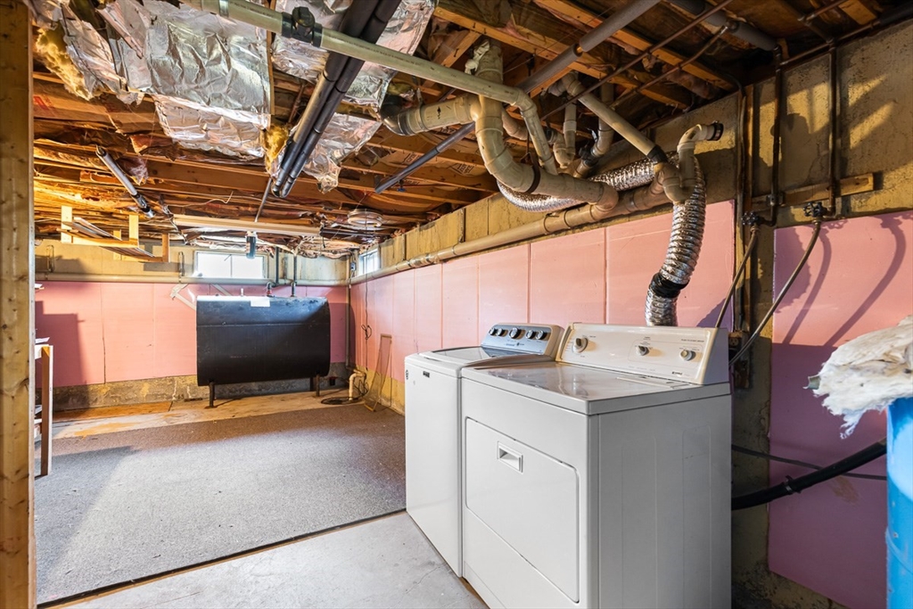 99 Swansom Road Swansea, MA 02777 - Photo 36 of 42 a view of storage and utility room with a washer and dryer