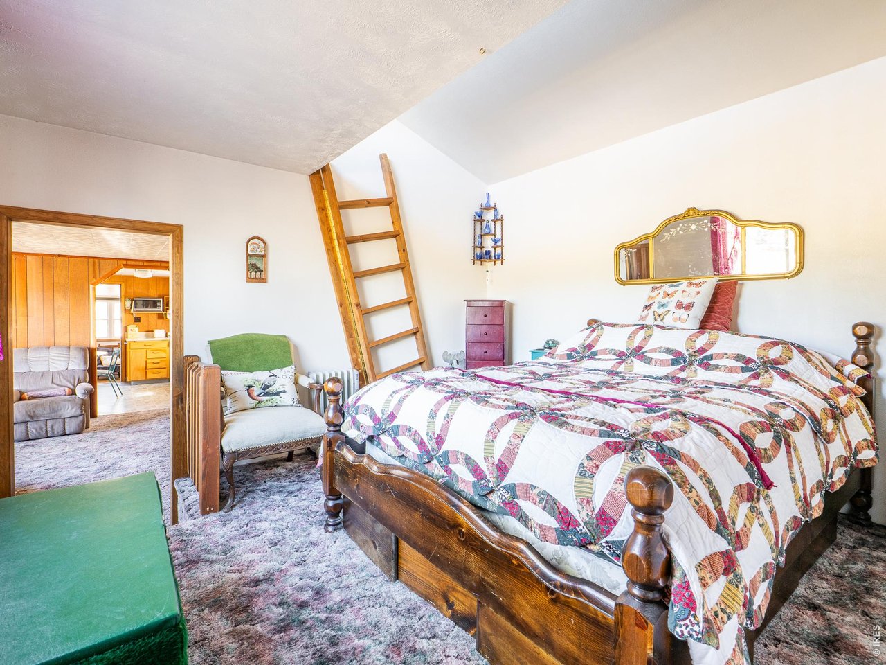 843 Nokomis Road Red Feather Lakes, CO 80545 - Photo 11 of 20 Primary bedroom with loft space above