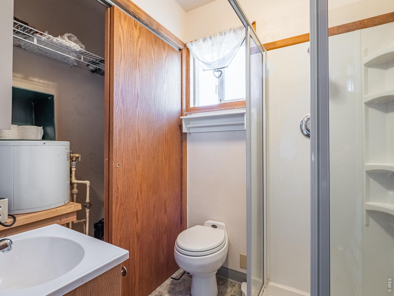 843 Nokomis Road Red Feather Lakes, CO 80545 - Photo 15 of 20 Bathroom with toilet, sink and shower