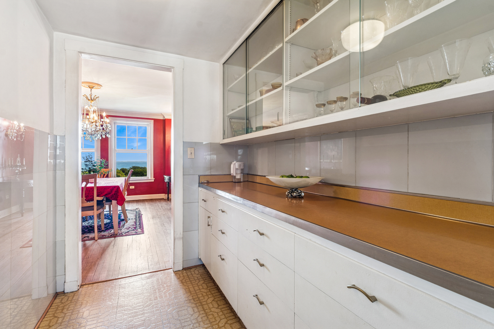 5000 North Marine Drive, Unit 9C Chicago, IL 60640 - Photo 13 of 20 a kitchen with a sink and cabinets