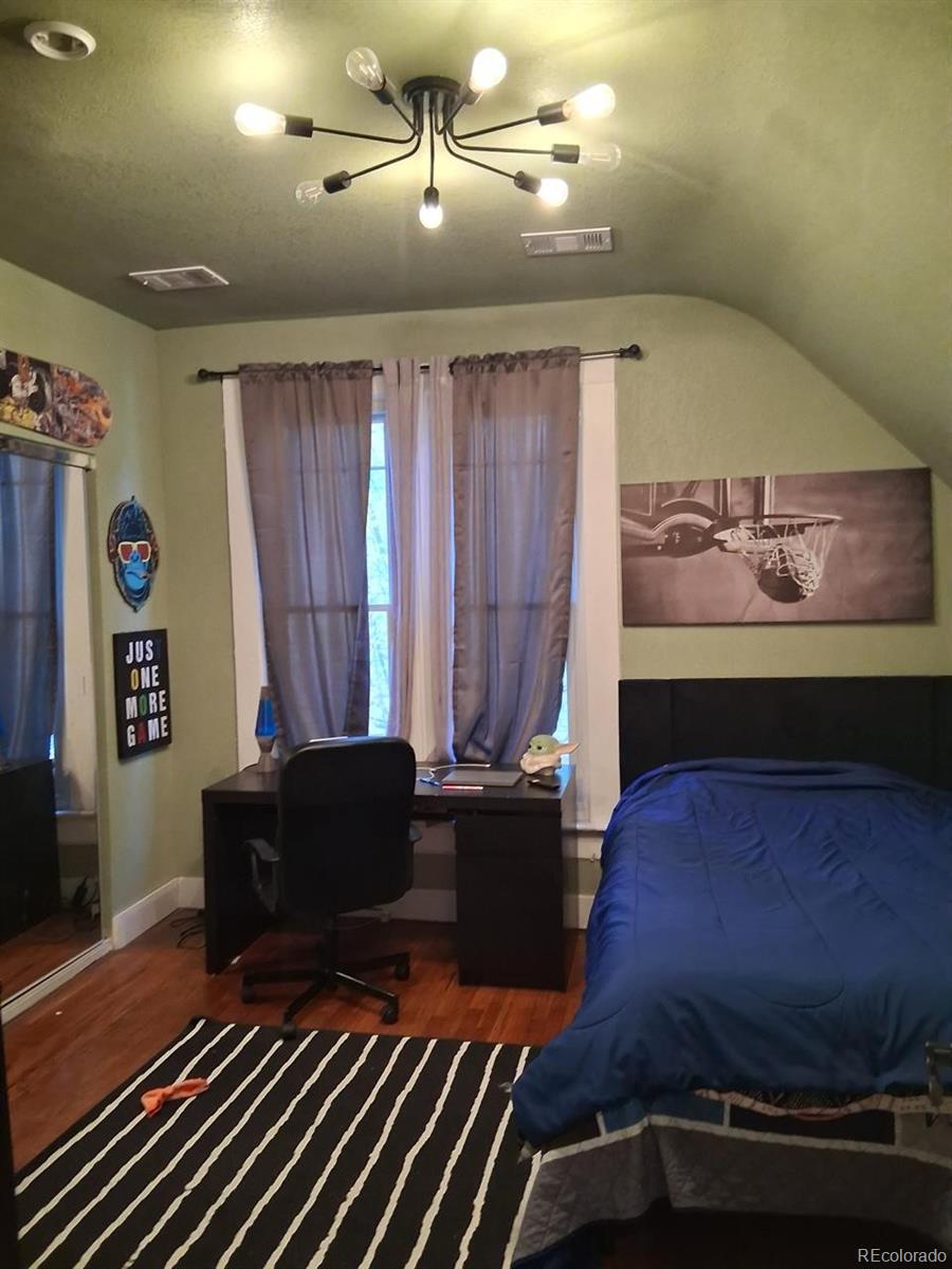 451 Acoma Street Denver, CO 80204 - Photo 14 of 19 a living room with furniture