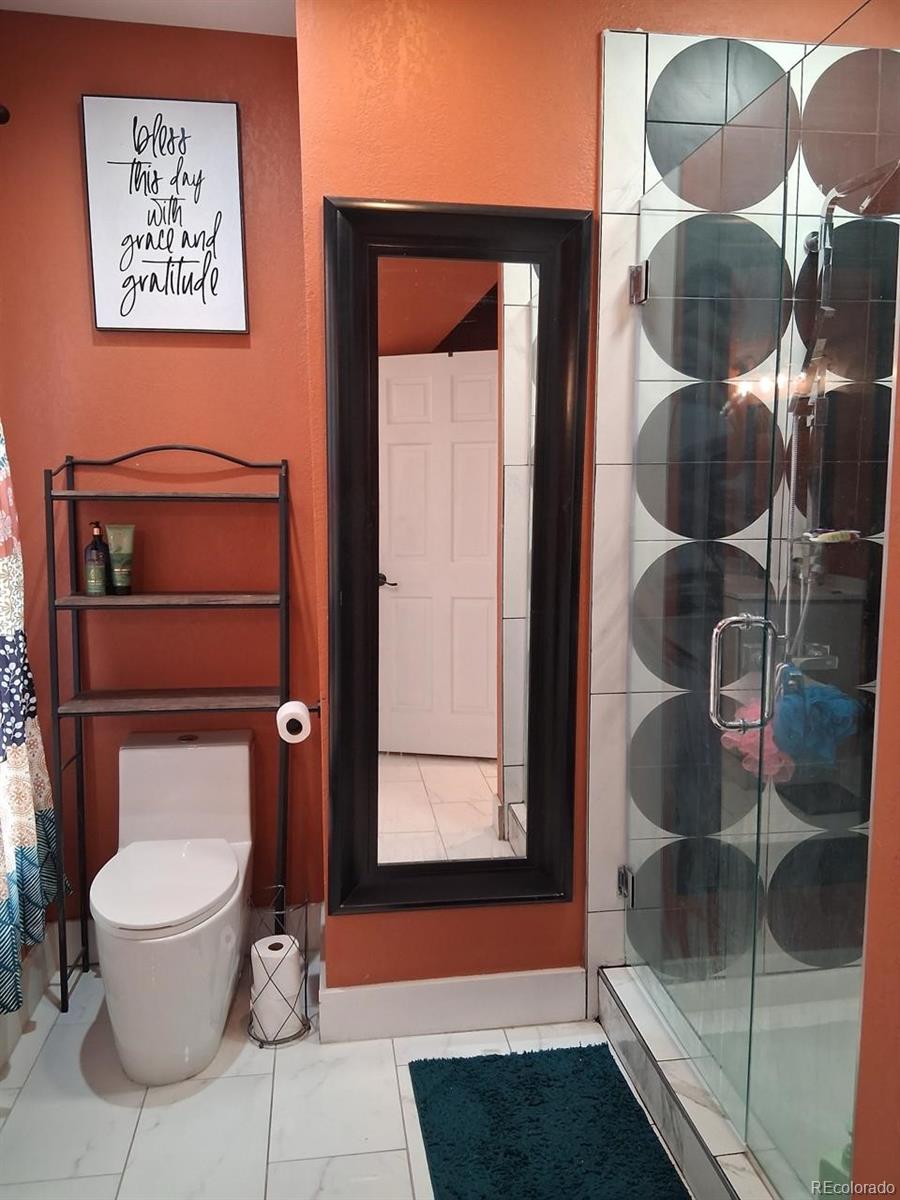 451 Acoma Street Denver, CO 80204 - Photo 5 of 19 a bathroom with a toilet